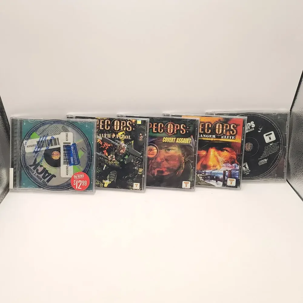 Playstation Lot of 25 Games Spec Ops Sno Cross Asteroids Cyber Tiger Test Drive